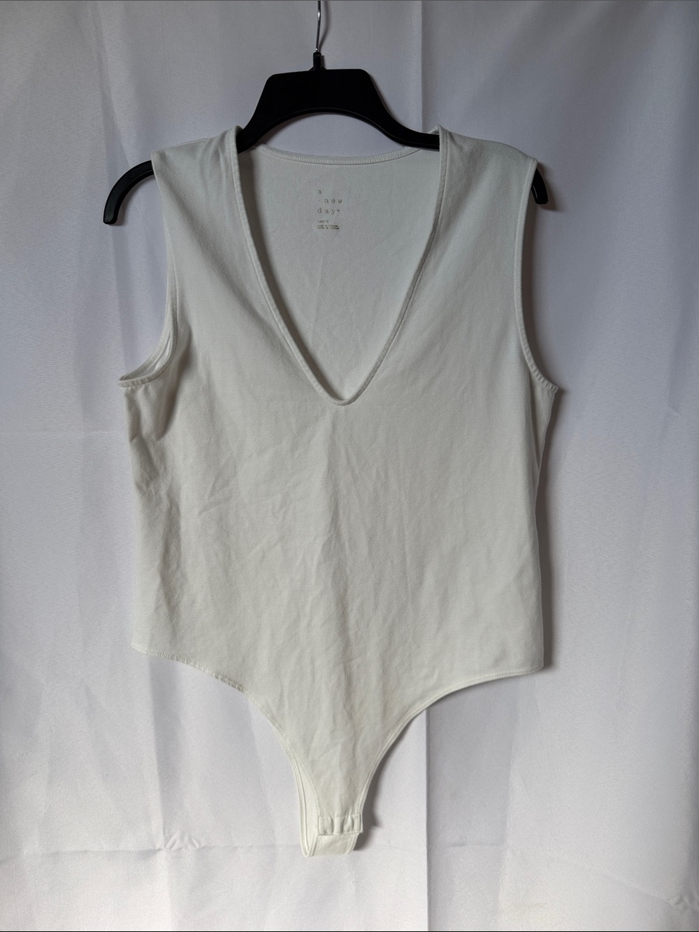 Sleeveless V-Neck White Bodysuit Top